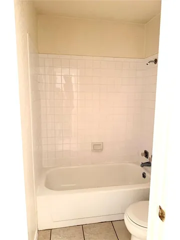 a bathroom with a double vanity sink and mirror