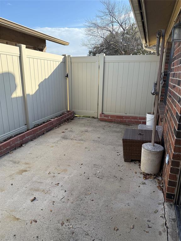 2240 Tarpley Road, Unit 31 Carrollton, TX 75006 - Photo 18 of 18 a view of an house with backyard and sitting area