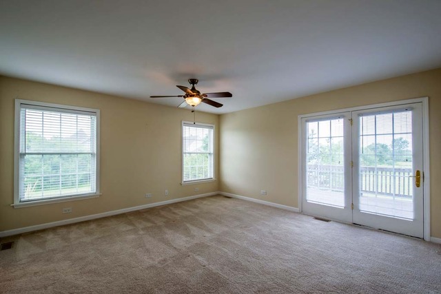 12N330 Switzer Road Elgin, IL 60124 - Photo 15 of 25 a view of an empty room with a window