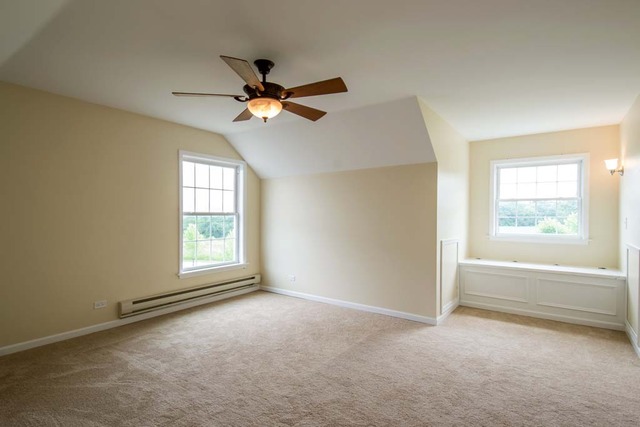 12N330 Switzer Road Elgin, IL 60124 - Photo 18 of 25 a view of an empty room with a window