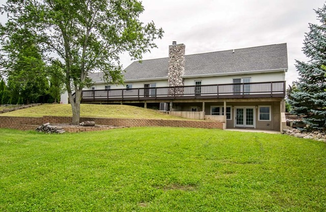 12N330 Switzer Road Elgin, IL 60124 - Photo 25 of 25 a view of a house with a yard