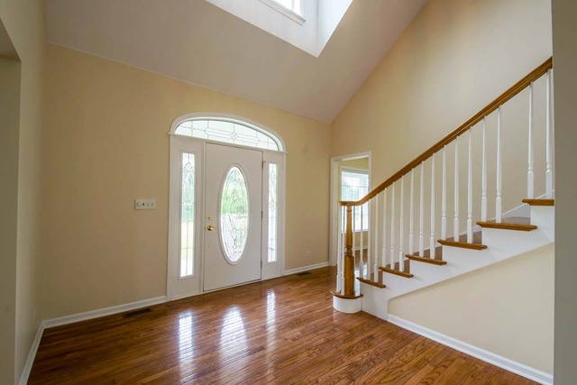 12N330 Switzer Road Elgin, IL 60124 - Photo 6 of 25 a view of an entryway with wooden floor