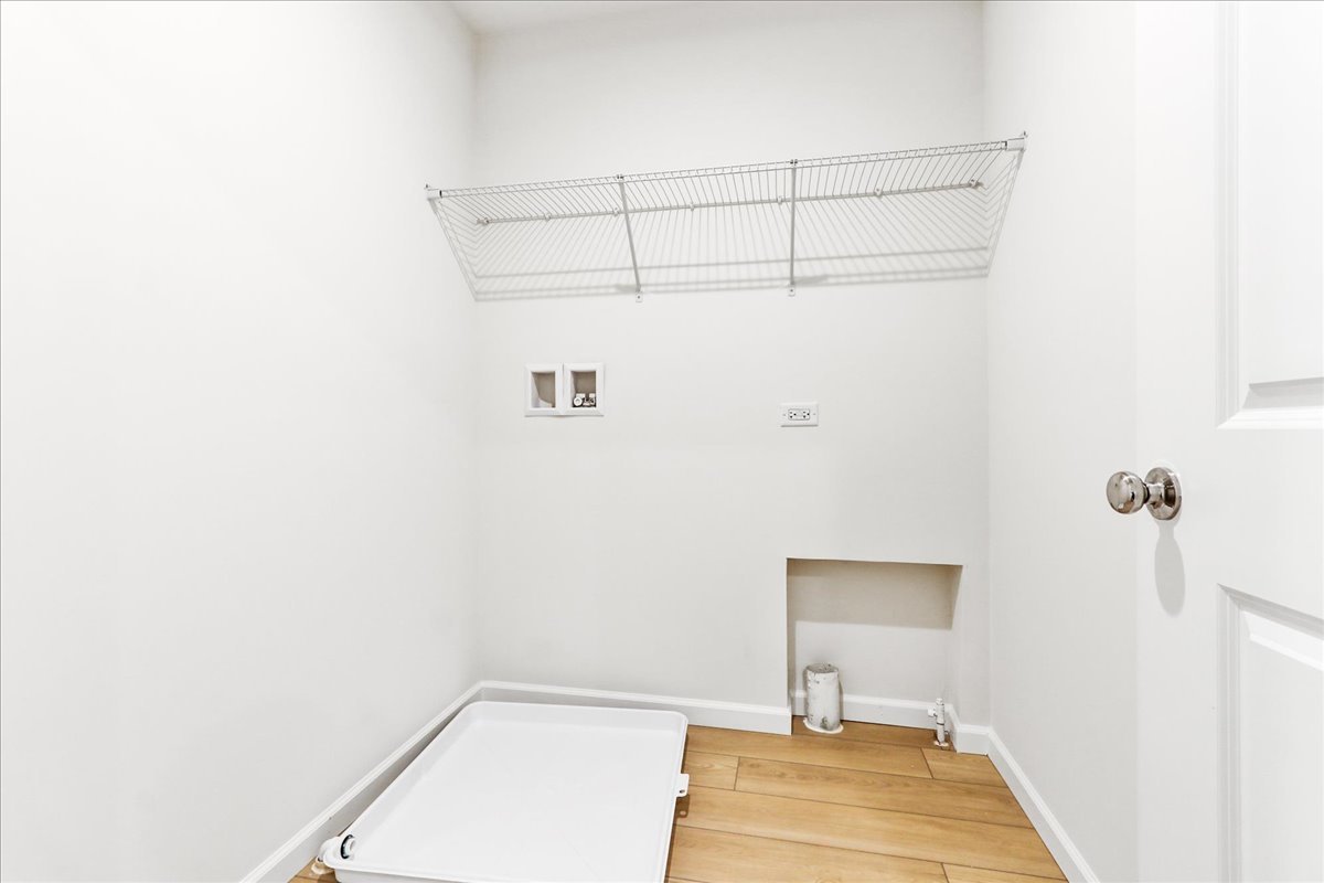 644 Switchgrass Way, Unit 59002 Bolingbrook, IL 60490 - Photo 24 of 26 a bathroom with a sink