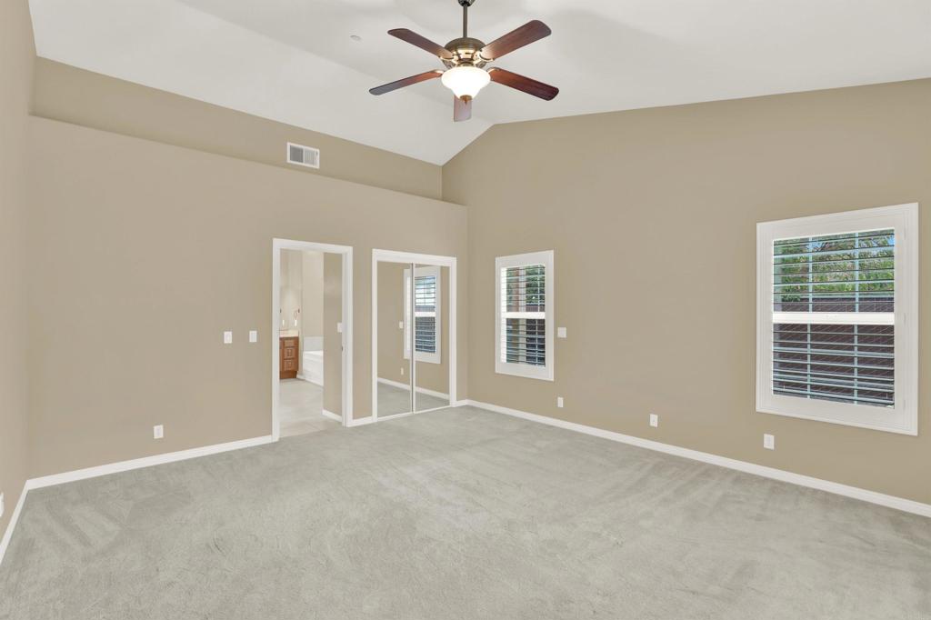 16308 Swartz Canyon Road Ramona, CA 92065 - Photo 14 of 29 a view of an empty room with a window