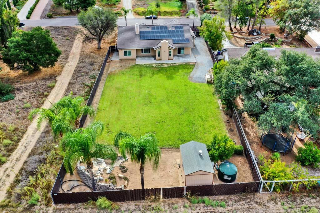 16308 Swartz Canyon Road Ramona, CA 92065 - Photo 28 of 29 an aerial view of a house with garden space and street view