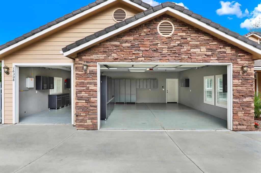 16308 Swartz Canyon Road Ramona, CA 92065 - Photo 3 of 29 a view of a house with a garage