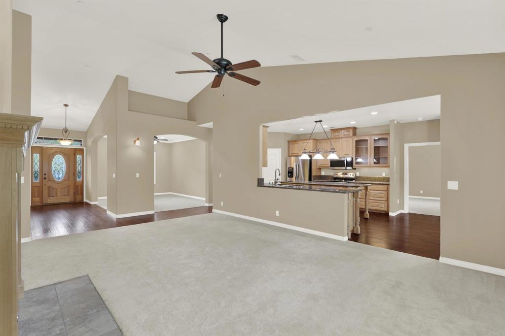 16308 Swartz Canyon Road Ramona, CA 92065 - Photo 6 of 29 a view of a kitchen with a sink and chandelier