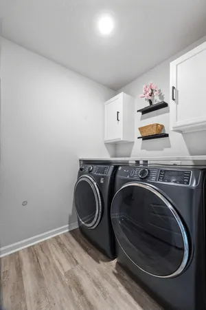 a view of a garage with rack and bicycle