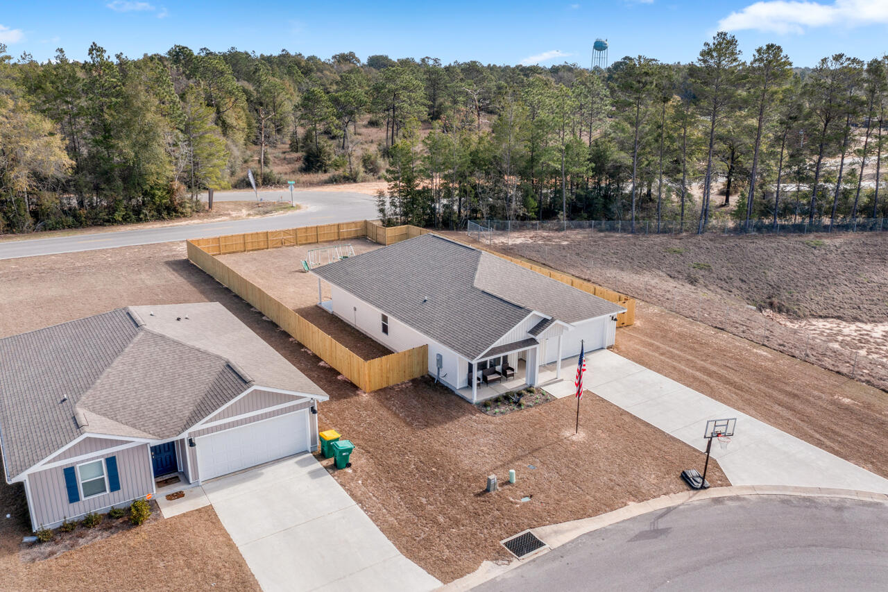 3411 Phoenix Court Crestview, FL 32539 - Photo 33 of 47 an aerial view of a house with a yard