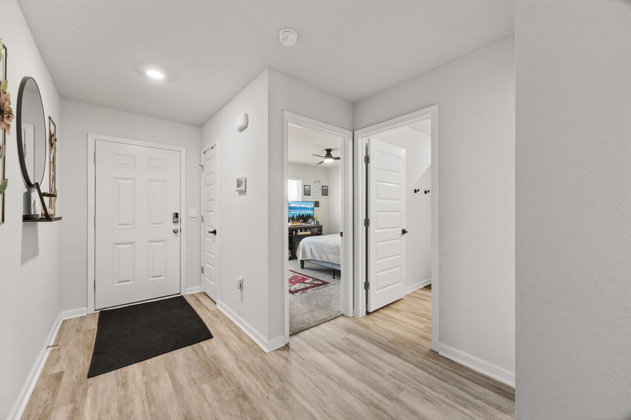 3411 Phoenix Court Crestview, FL 32539 - Photo 6 of 46 a view of hallway with wooden floor