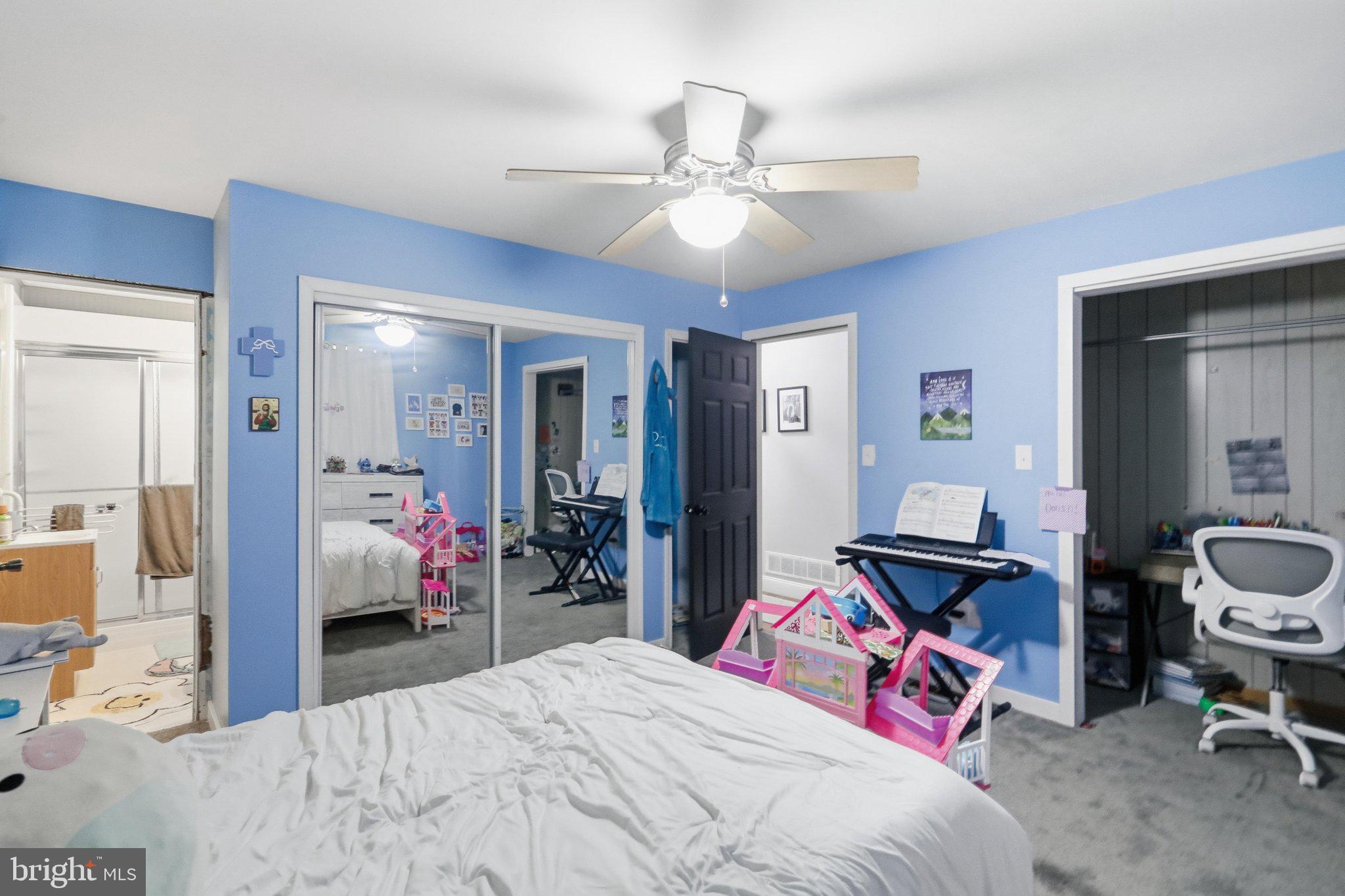 120 Motorcycle Lane Ridgeley, WV 26753 - Photo 23 of 34 a bedroom with bed and a mirror