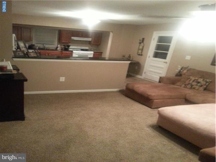 8 Collins Road Hamilton, NJ 08619 - Photo 11 of 23 a living room with furniture and a window