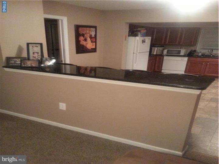 8 Collins Road Hamilton, NJ 08619 - Photo 9 of 23 a view of a refrigerator a sink