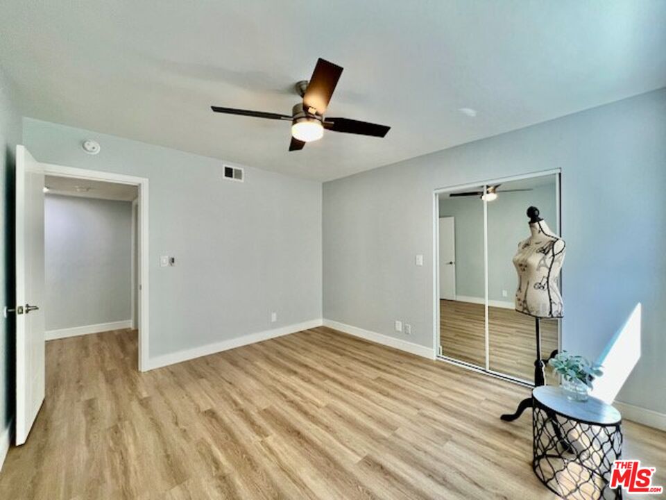 2012 South Bedford Street, Unit 1 Los Angeles, CA 90034 - Photo 11 of 17 a view of empty room with wooden floor