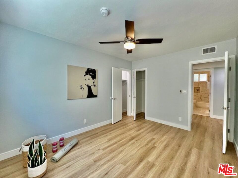 2012 South Bedford Street, Unit 1 Los Angeles, CA 90034 - Photo 13 of 17 a view of empty room with wooden floor