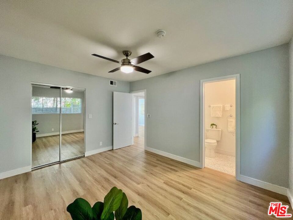2012 South Bedford Street, Unit 1 Los Angeles, CA 90034 - Photo 7 of 17 a view of an empty room and window