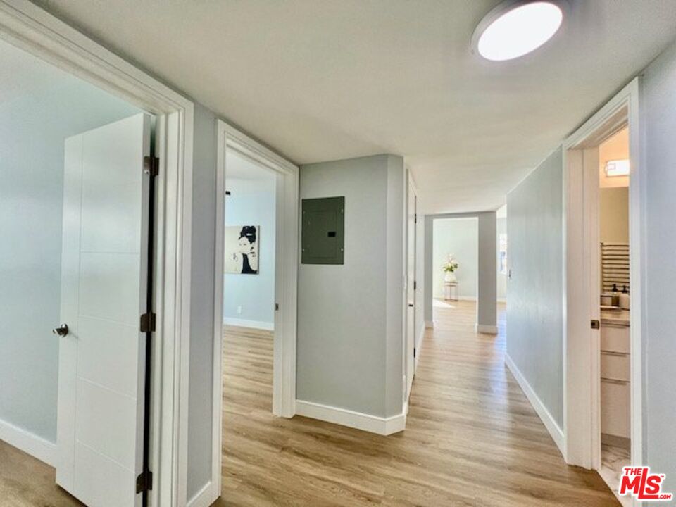 2012 South Bedford Street, Unit 1 Los Angeles, CA 90034 - Photo 9 of 17 a view of a hallway with wooden floor