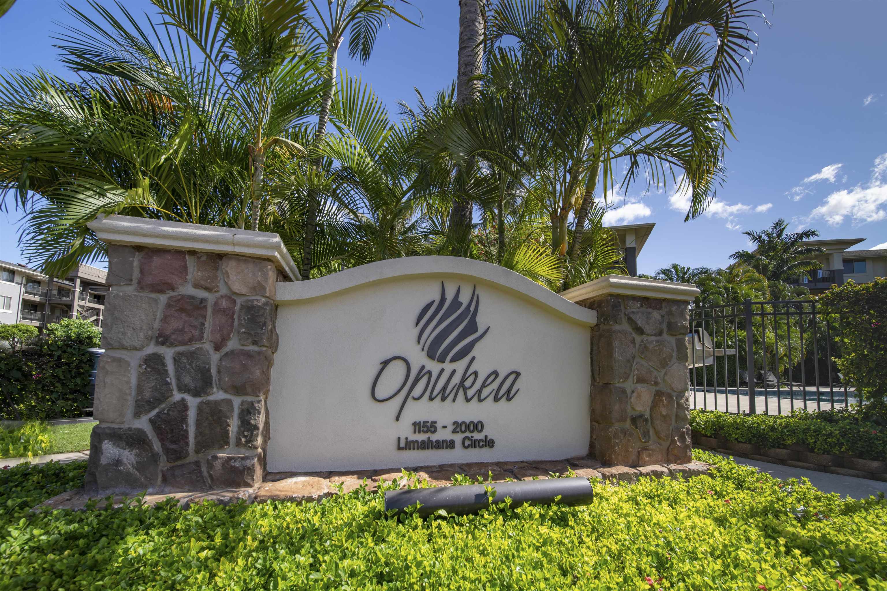 1233 Limahana Circle, Unit B202 Lahaina, HI 96761 - Photo 30 of 30 a sign that is sitting next to a yard