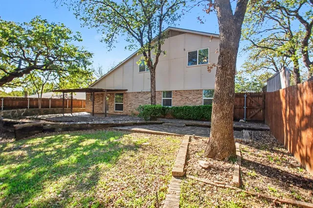a view of a house with swimming pool