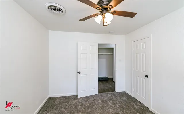 wooden floor in a hall with an entryway