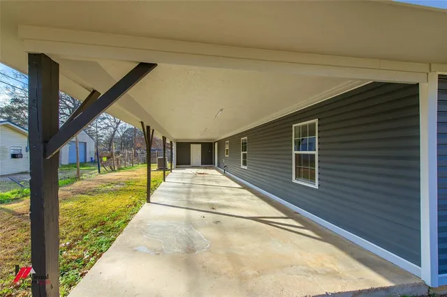 a view of swimming pool with seating space