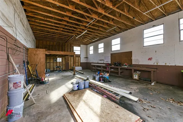 a room with furniture and a flat screen tv