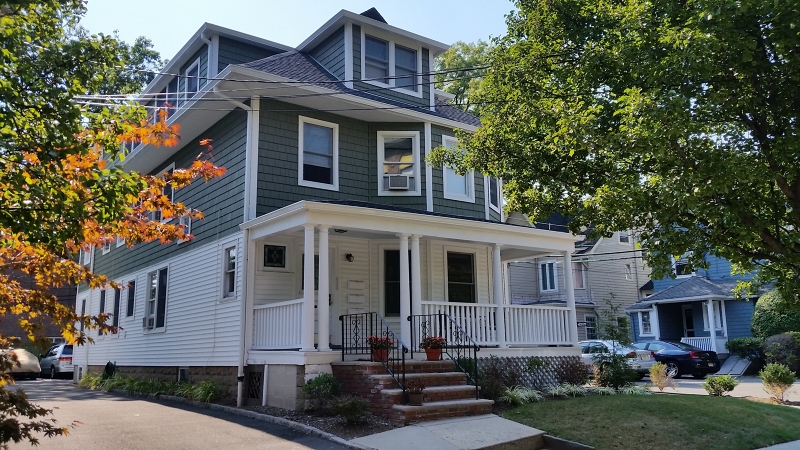 16 Munn Street, Unit 1 Montclair, NJ 07042 - Photo 1 of 22 a front view of a house with a yard