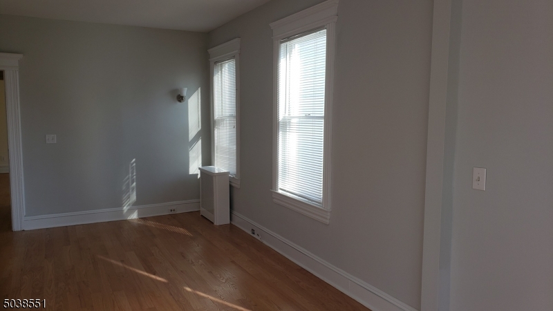 16 Munn Street, Unit 1 Montclair, NJ 07042 - Photo 11 of 22 an empty room with windows