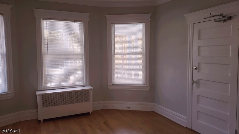 16 Munn Street, Unit 1 Montclair, NJ 07042 - Photo 4 of 22 an empty room with a window