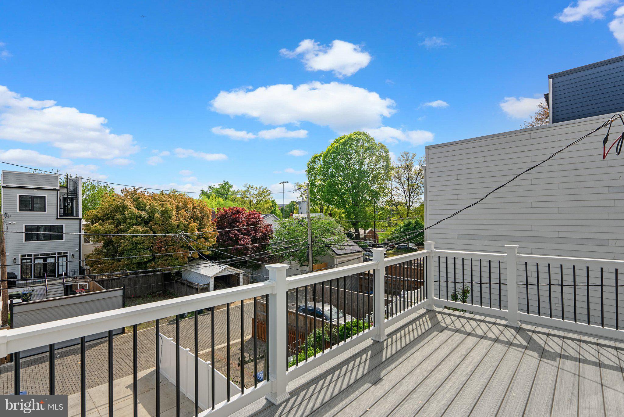 3710 S Street Northwest Washington, DC 20007 - Photo 13 of 32 a view of a balcony with wooden floor