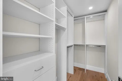a view of an empty walk in closet