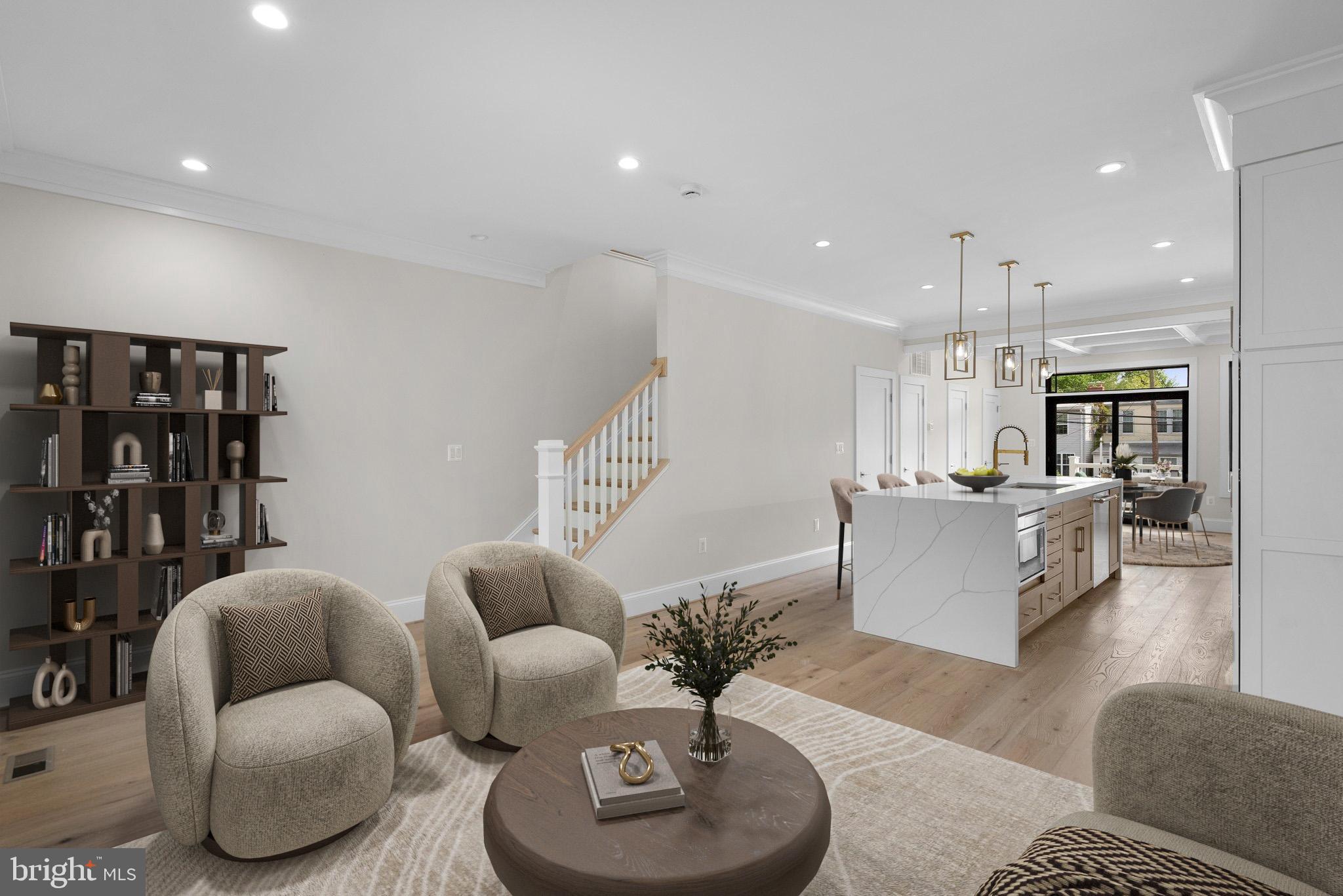 3710 S Street Northwest Washington, DC 20007 - Photo 2 of 32 a living room with furniture kitchen view and a chandelier