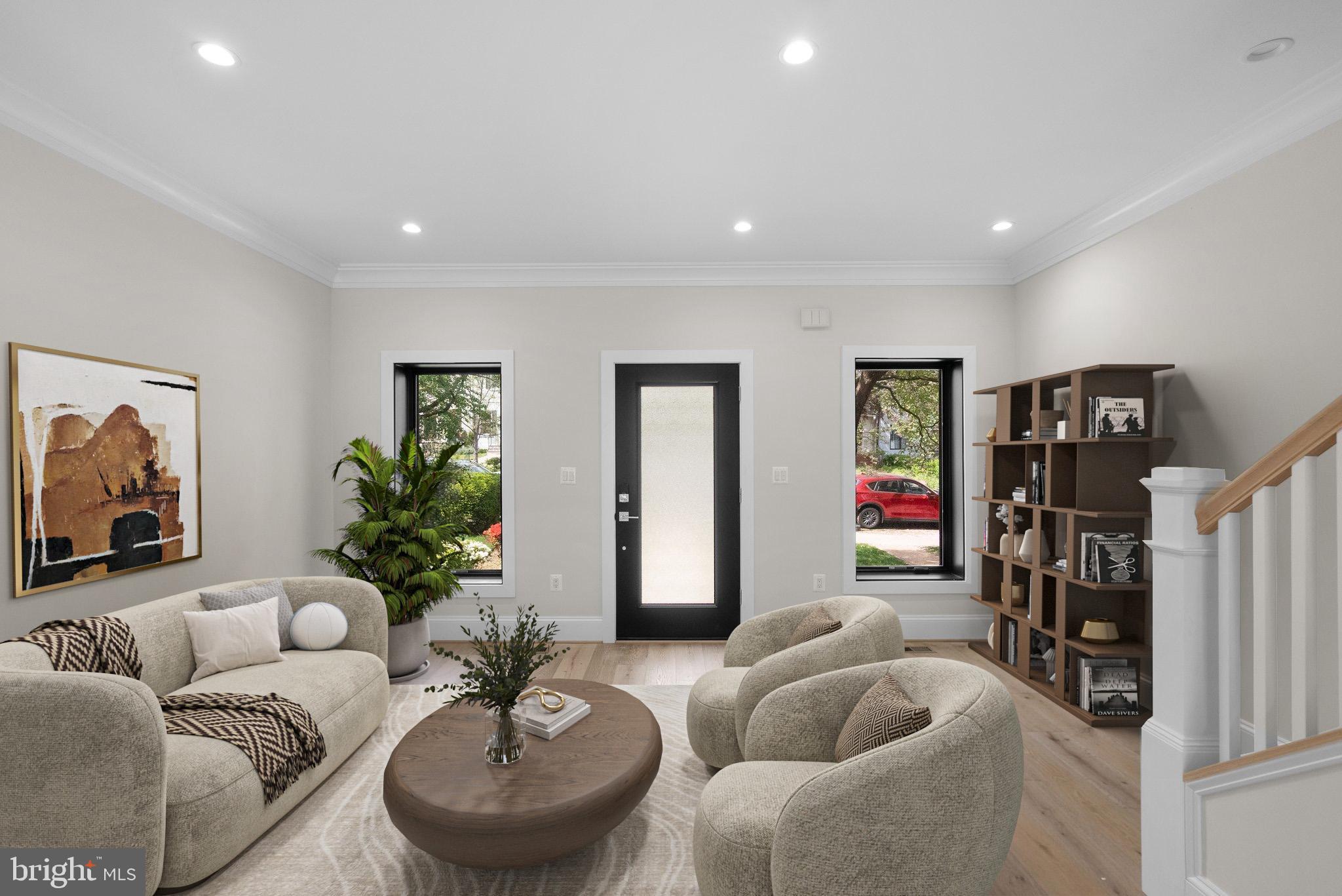 3710 S Street Northwest Washington, DC 20007 - Photo 3 of 32 a living room with furniture and a potted plant