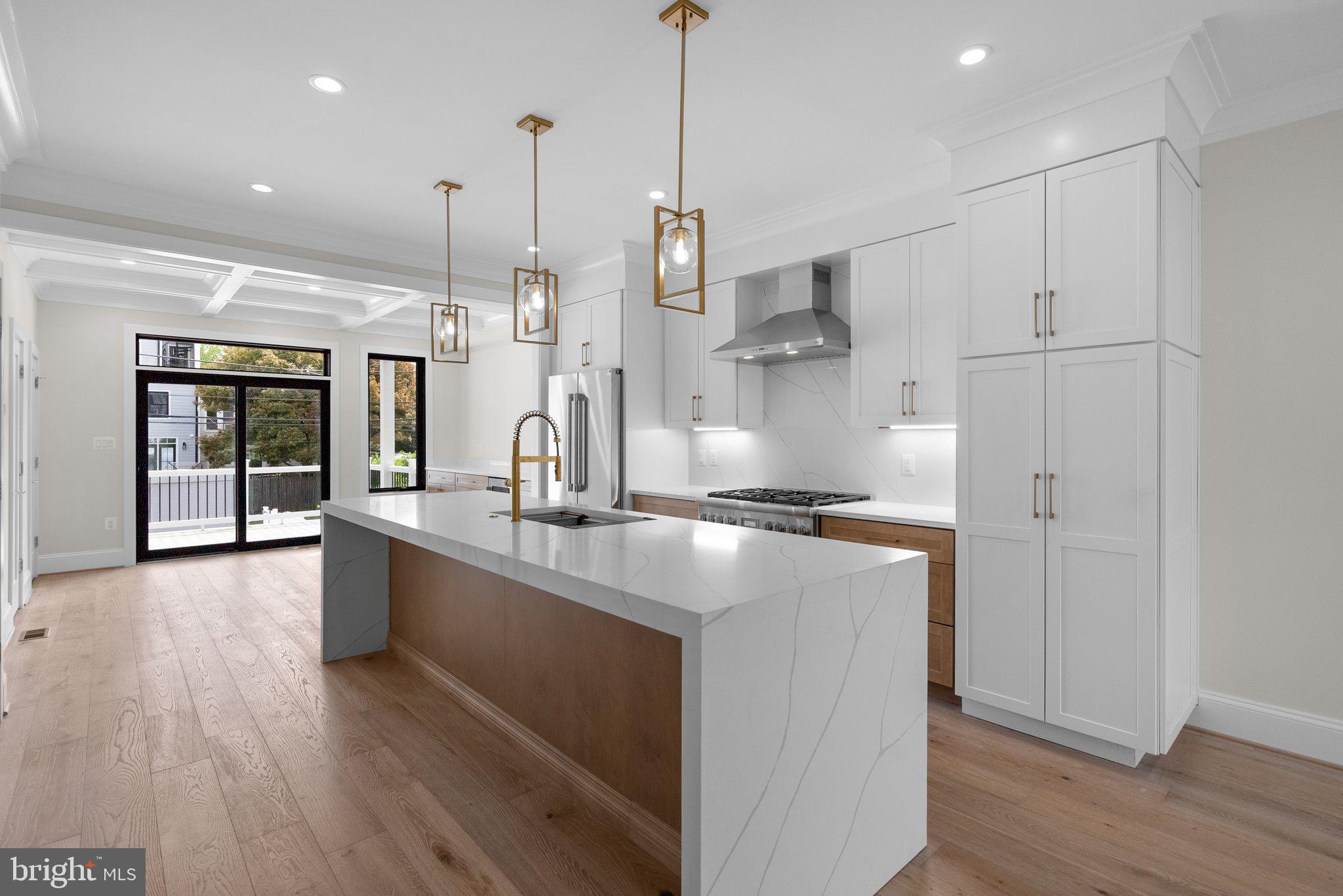 3710 S Street Northwest Washington, DC 20007 - Photo 6 of 32 a kitchen with counter top space and wooden floor