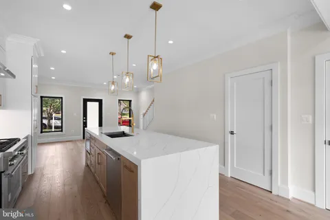 a view of living room and kitchen