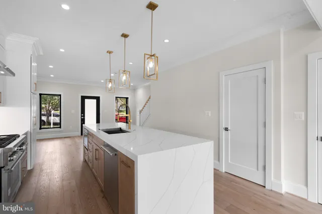 a view of living room and kitchen