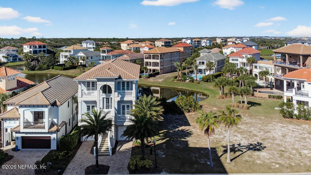 320 Ocean Crest Drive Palm Coast, FL 32137 - Photo 17 of 93 an aerial view of multiple house