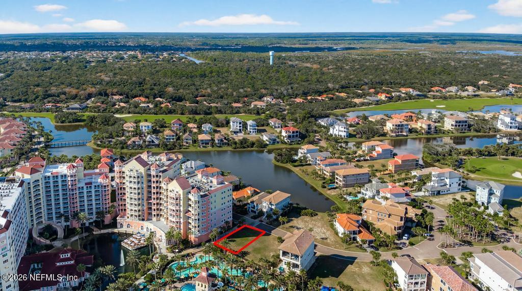 320 Ocean Crest Drive Palm Coast, FL 32137 - Photo 25 of 93 an aerial view of city and lake