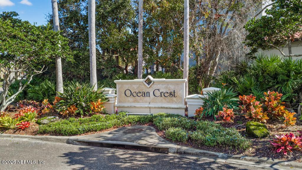 320 Ocean Crest Drive Palm Coast, FL 32137 - Photo 35 of 93 a sign on the side of the road