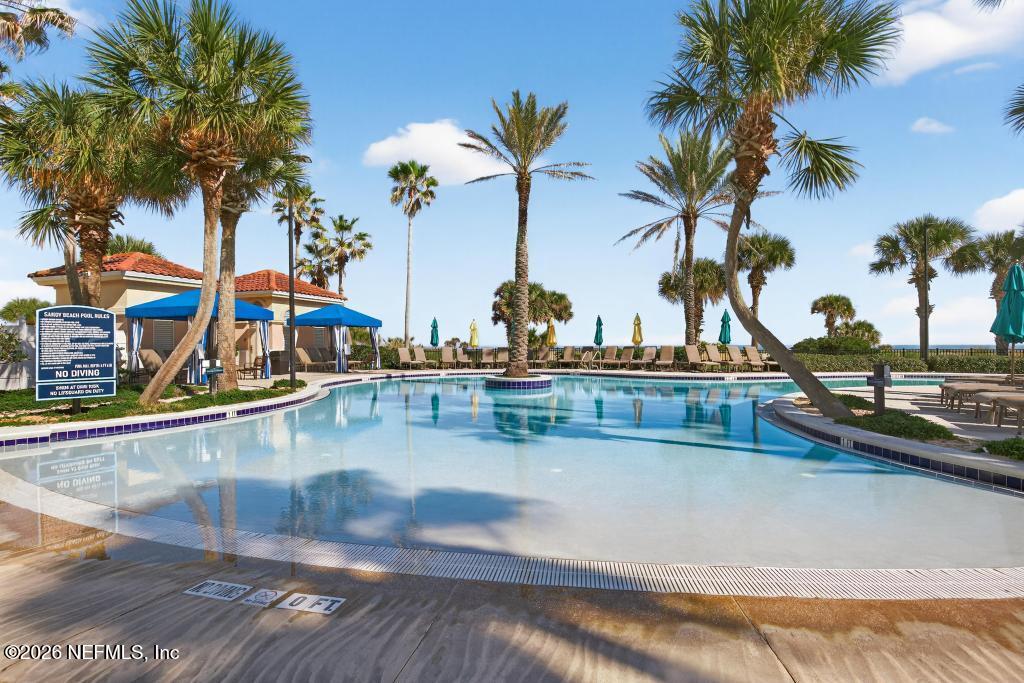 320 Ocean Crest Drive Palm Coast, FL 32137 - Photo 61 of 93 a view of outdoor space with trees