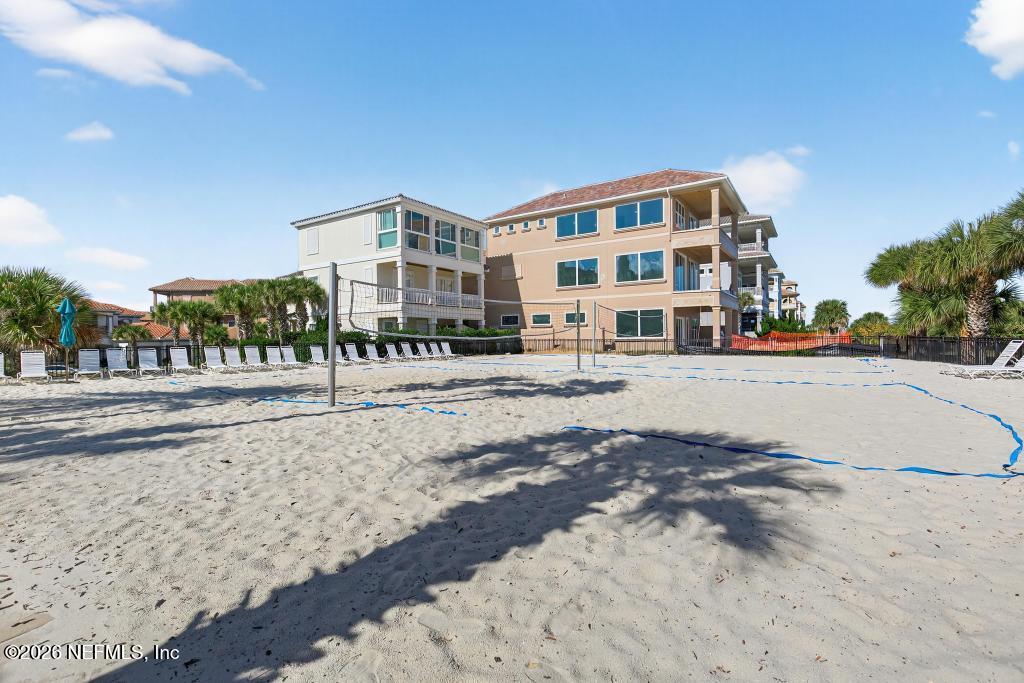 320 Ocean Crest Drive Palm Coast, FL 32137 - Photo 63 of 93 a view of a street with a building in the background