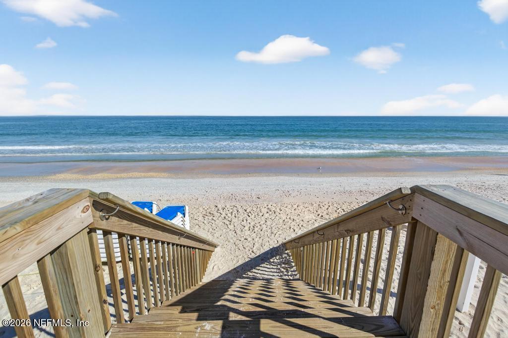 320 Ocean Crest Drive Palm Coast, FL 32137 - Photo 74 of 93 a view of staircase with railing and white walls