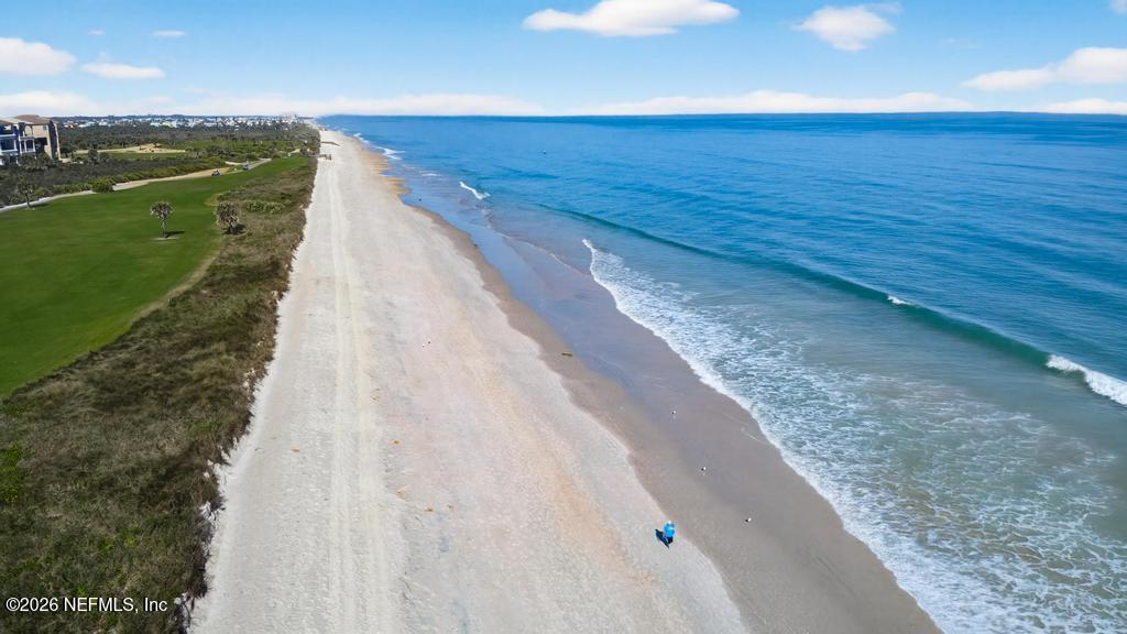 320 Ocean Crest Drive Palm Coast, FL 32137 - Photo 80 of 93 a view of an ocean beach and an outdoor space