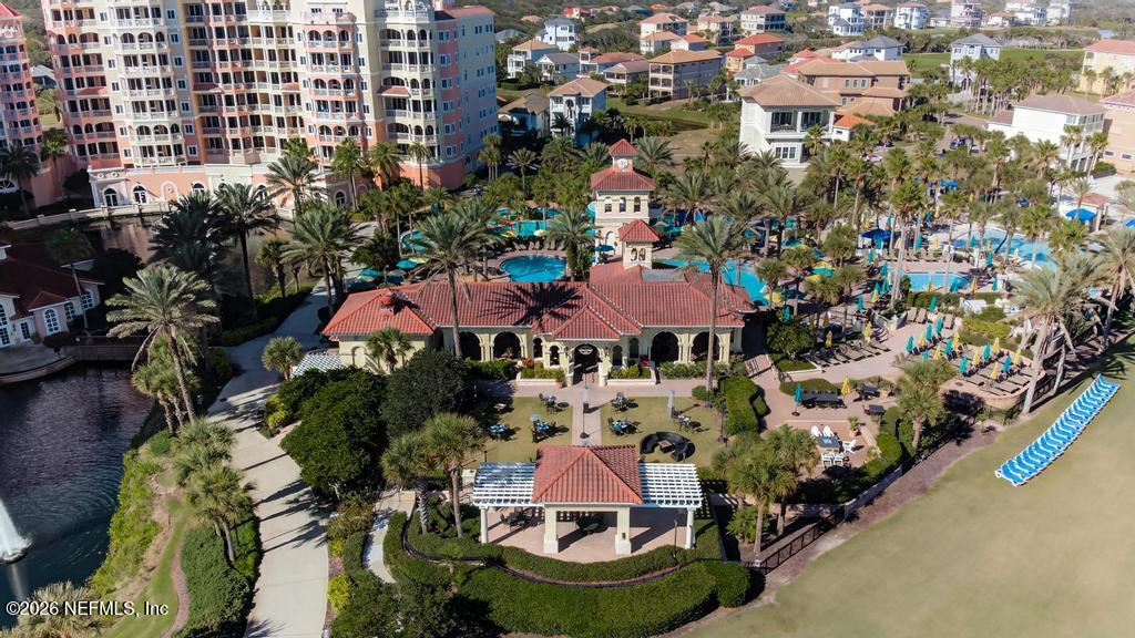 320 Ocean Crest Drive Palm Coast, FL 32137 - Photo 85 of 93 an aerial view of multiple houses with yard