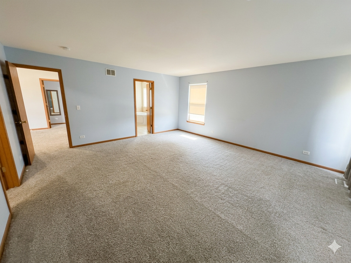 966 Forest View Way Antioch, IL 60002 - Photo 14 of 23 a view of an empty room with a window