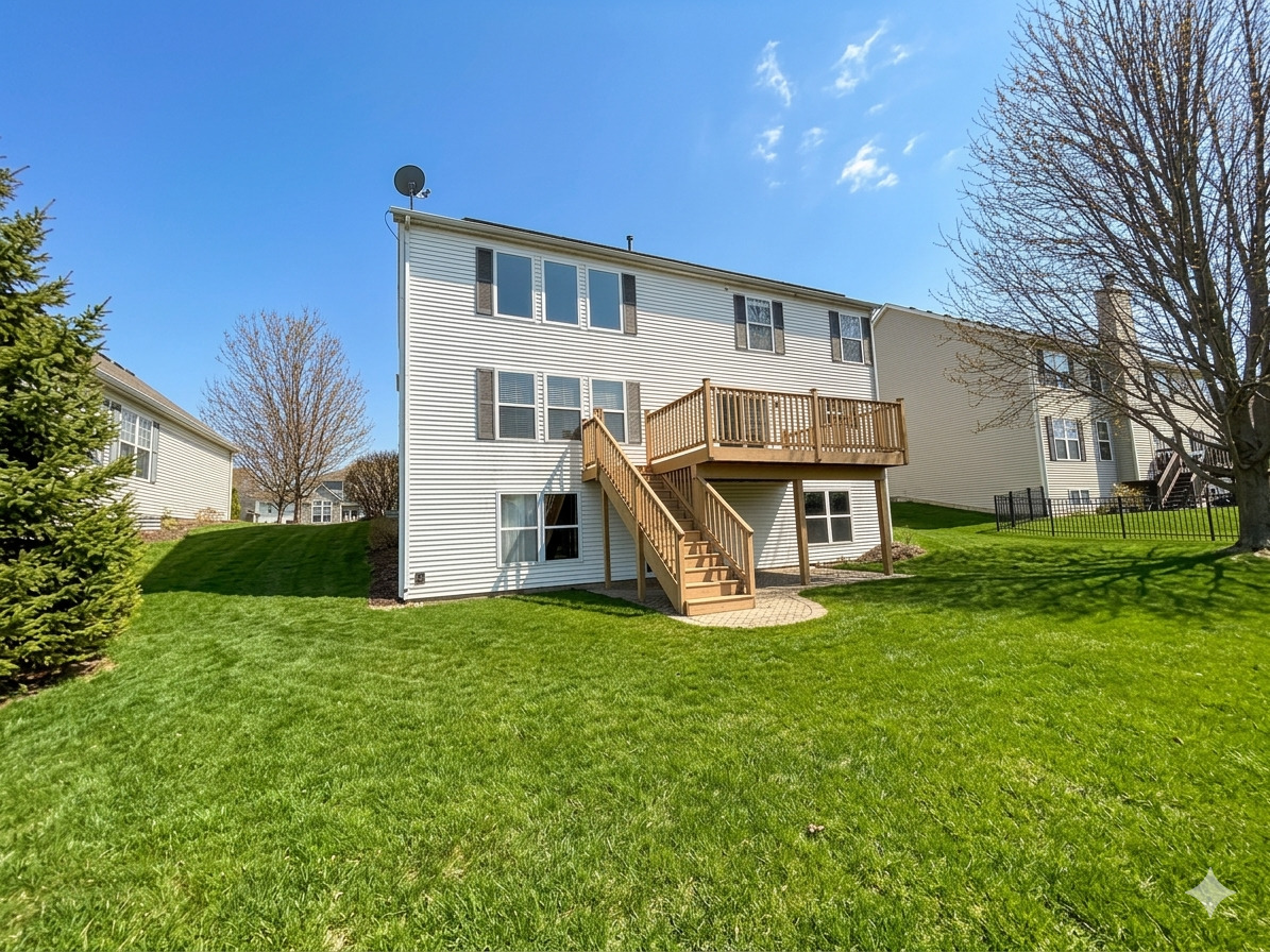 966 Forest View Way Antioch, IL 60002 - Photo 21 of 23 a front view of house with yard and green space