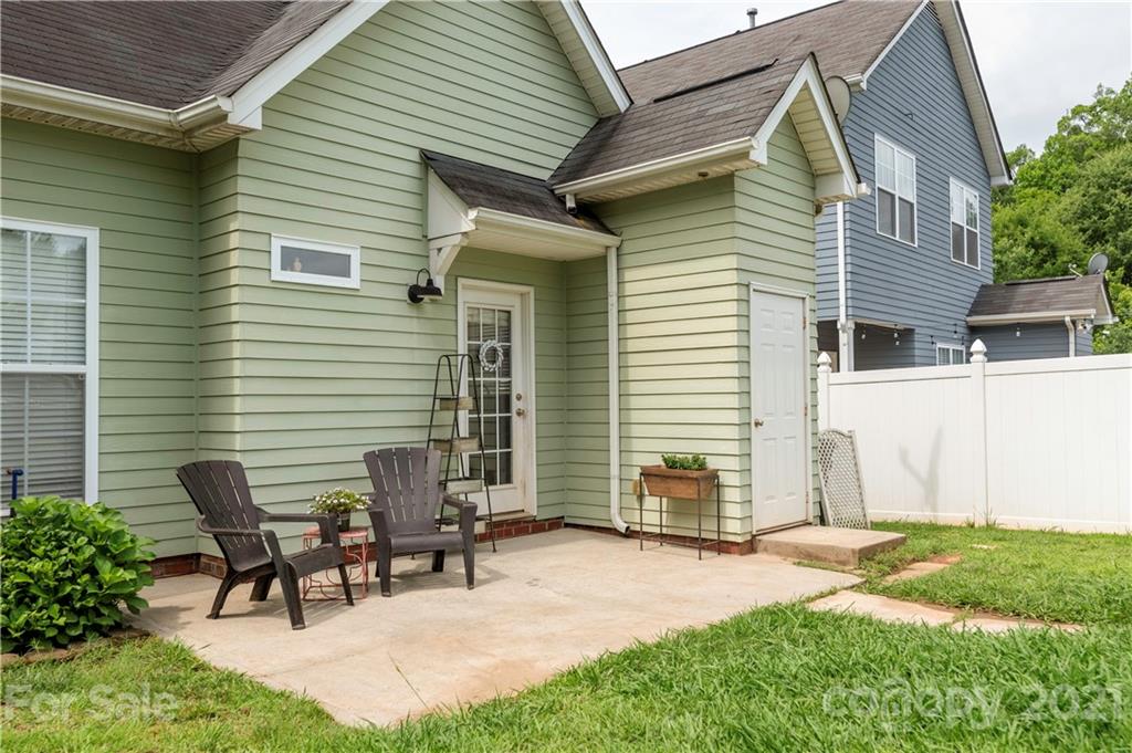 8237 Bud Henderson Road Huntersville, NC 28078 - Photo 22 of 25 a view of a house with backyard and sitting area