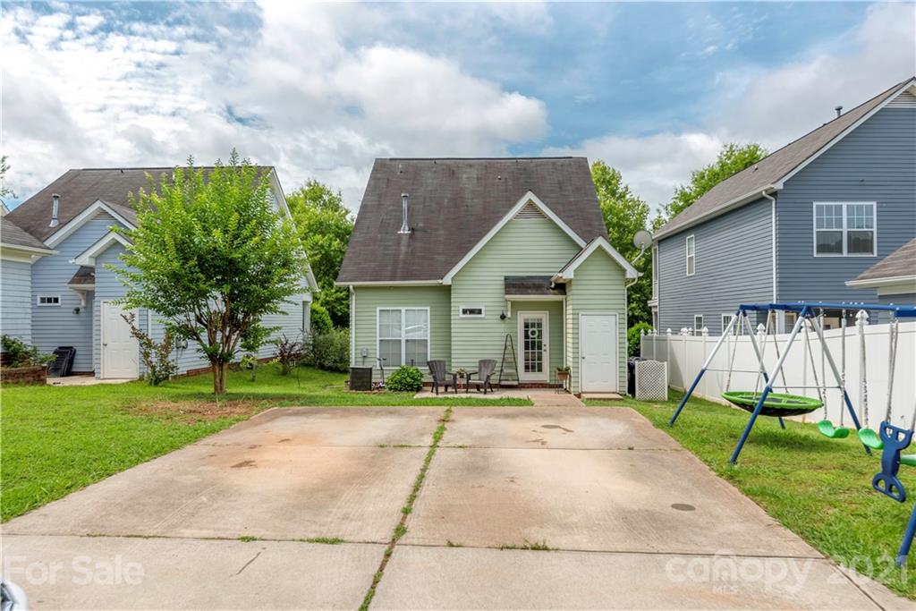 8237 Bud Henderson Road Huntersville, NC 28078 - Photo 24 of 25 a front view of a house with a yard