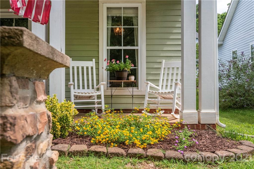 8237 Bud Henderson Road Huntersville, NC 28078 - Photo 4 of 25 a view of a house with a small yard and wooden fence