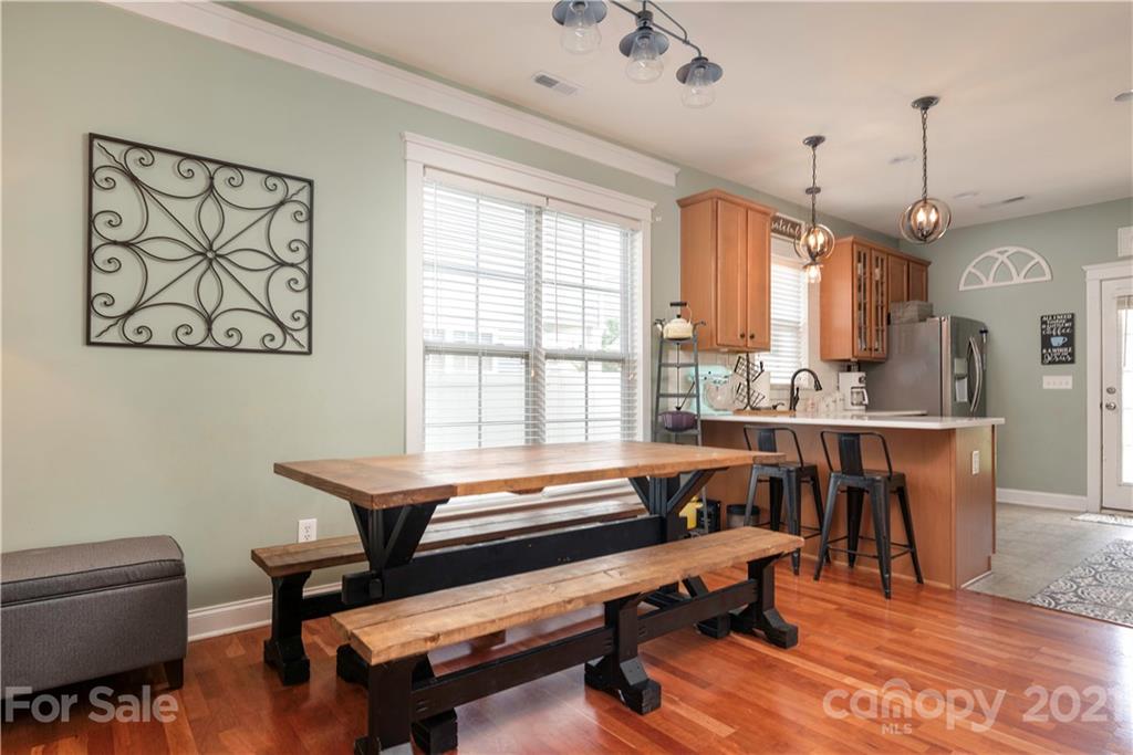 8237 Bud Henderson Road Huntersville, NC 28078 - Photo 8 of 25 a room with furniture pool table and windows